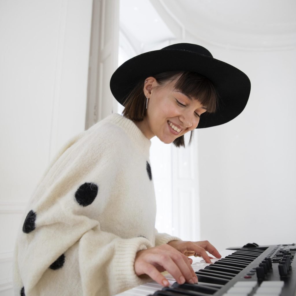young-woman-playing-piano-indoors